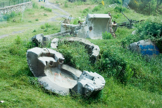 Albania photo: Exploded Communist era defensive Albanian bunkers. Concrete dome shelter - bunker built during Enver Hoxha's rule all over Albania as protection against a foreign invasion. 